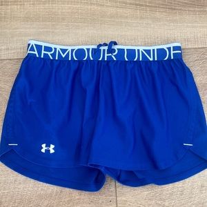 ROYAL BLUE UNDER ARMOUR SHORTS. size small, loose fit